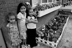 Picture of four girls showing off a window box